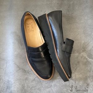 Black platform loafers